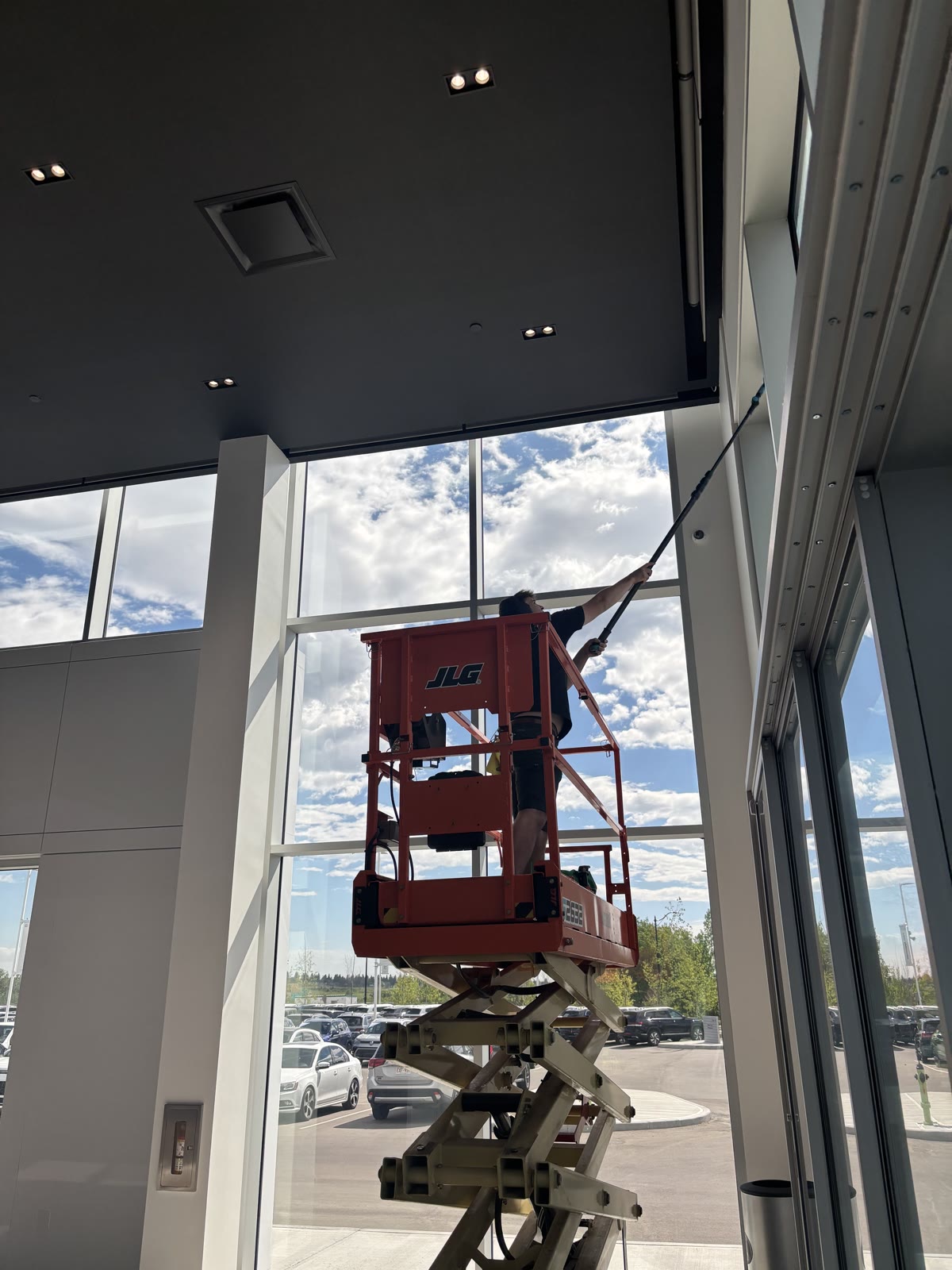 SudBuds crew cleaning commercial glass in Calgary