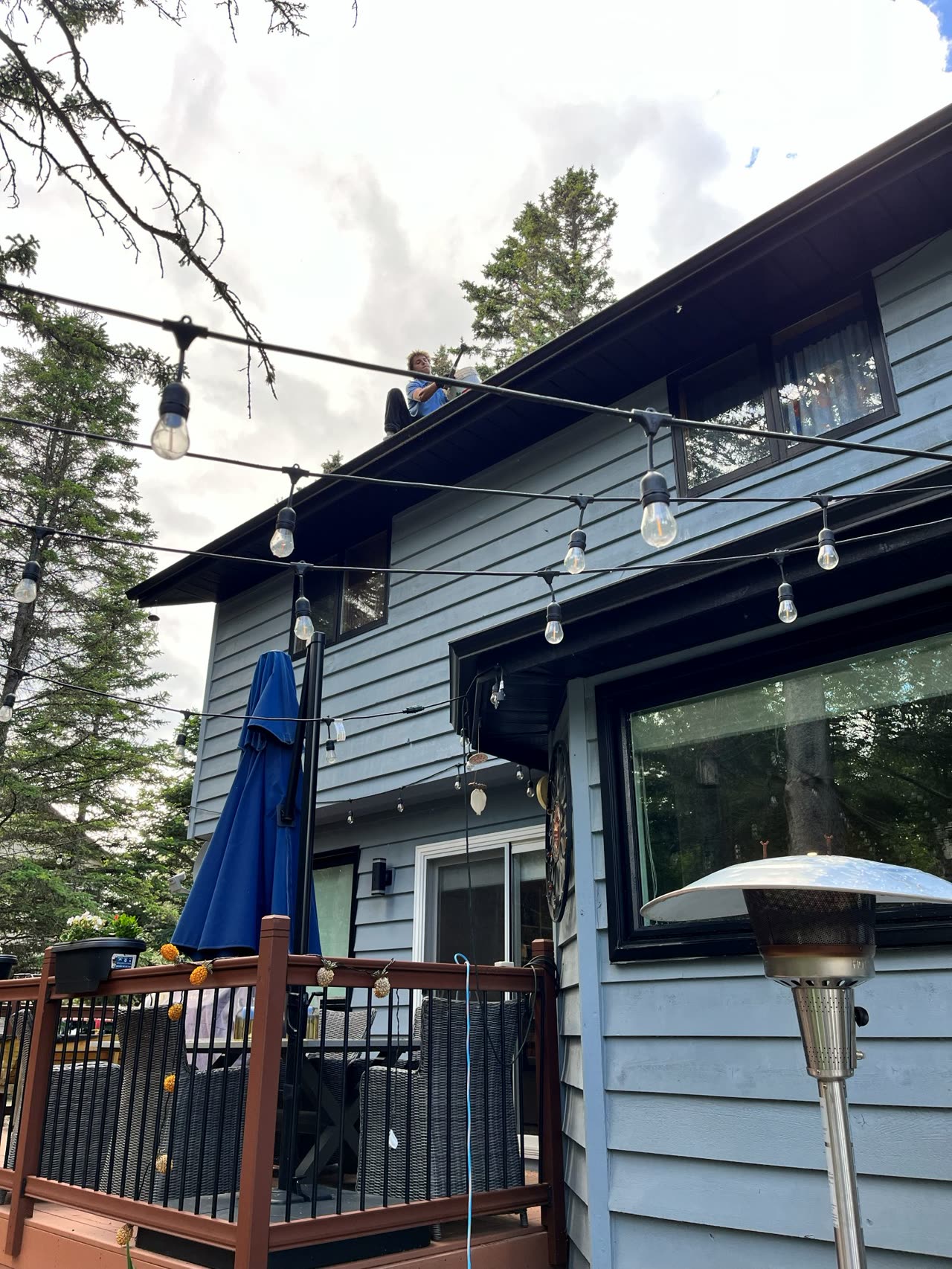Cleaning at height on a roofline